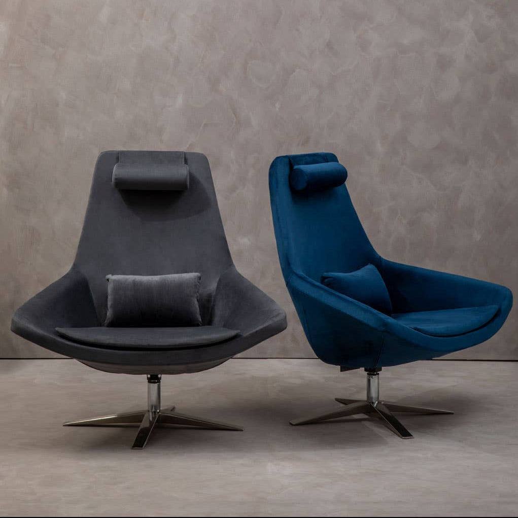 modern armchair with metal swivel base and neck pillow in blue or grey 