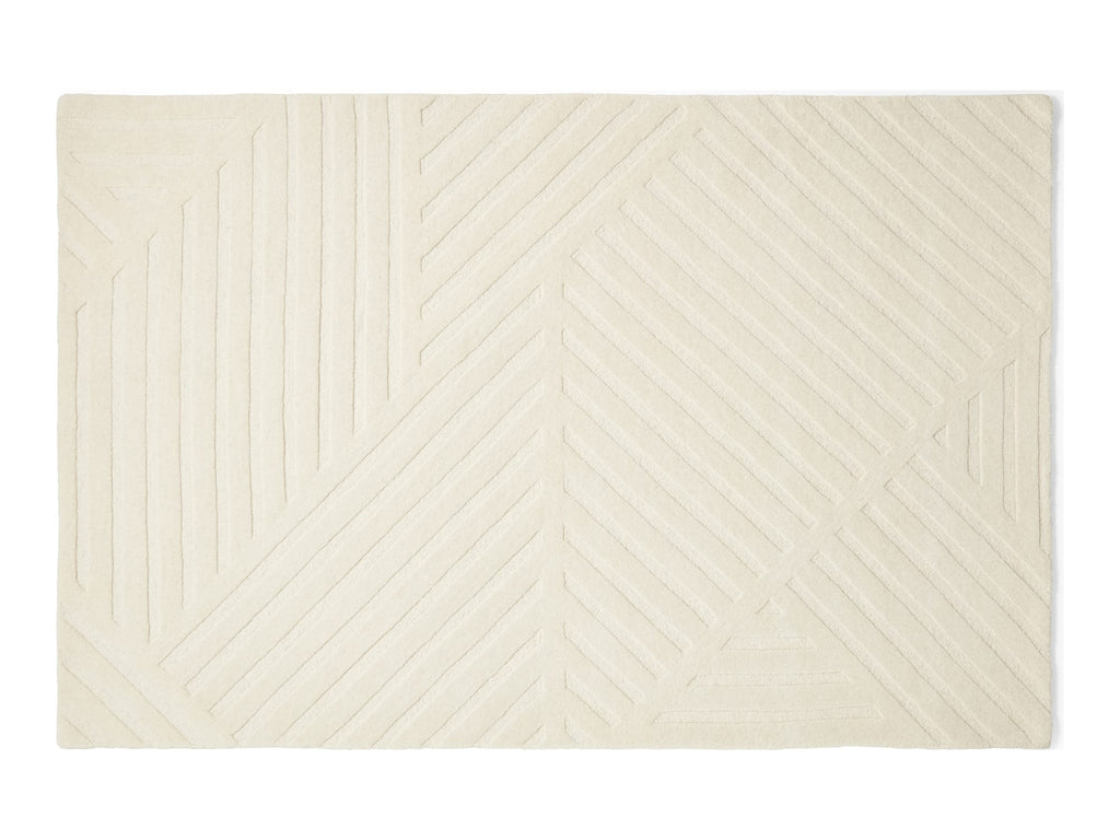 An off-white textured area rug with a geometric pattern of raised diagonal lines, shown flat against a white background.
