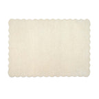 A rectangular cream-colored rug with scalloped edges, shown flat against a solid white background.