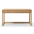 A light natural wood writing desk with two drawers featuring vertical slat fronts and a matching  top, supported by four angled legs, shown against a plain white background.
