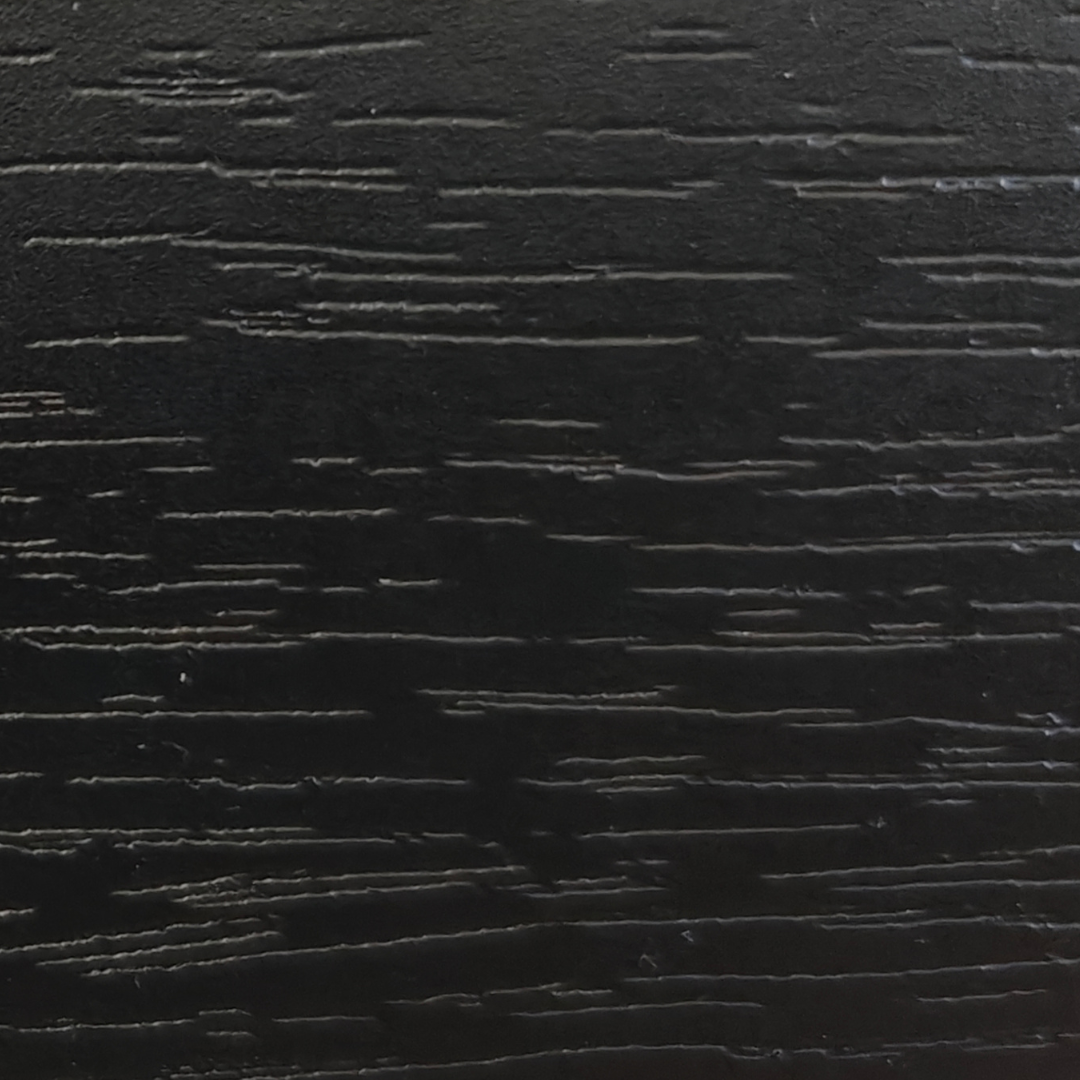 Textured black surface with horizontal lines