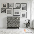 Cabinet with geometric pattern on a white background in a wonderful black and white room - mother of pearl