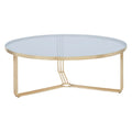 A large circular coffee table with a gray marble top and a brass frame.